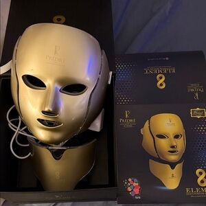 Predire Gold LED Face Mask with 8 colors of LED lights.